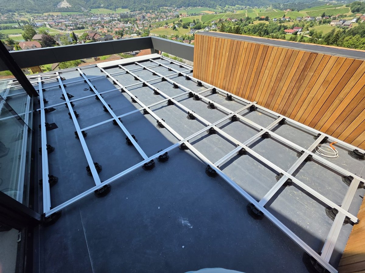 Vitaro pedestals installed on a rooftop terrace overlooking the Slovenian countryside