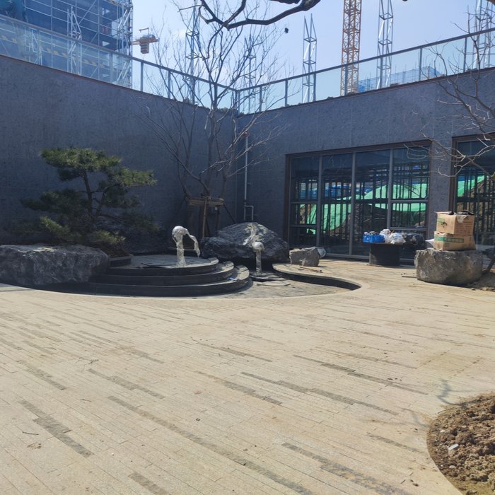 Courtyard water feature paved with Vitaro pedestals