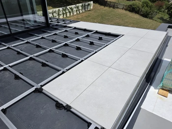 Outdoor paved terrace on Vitaro pedestal grid