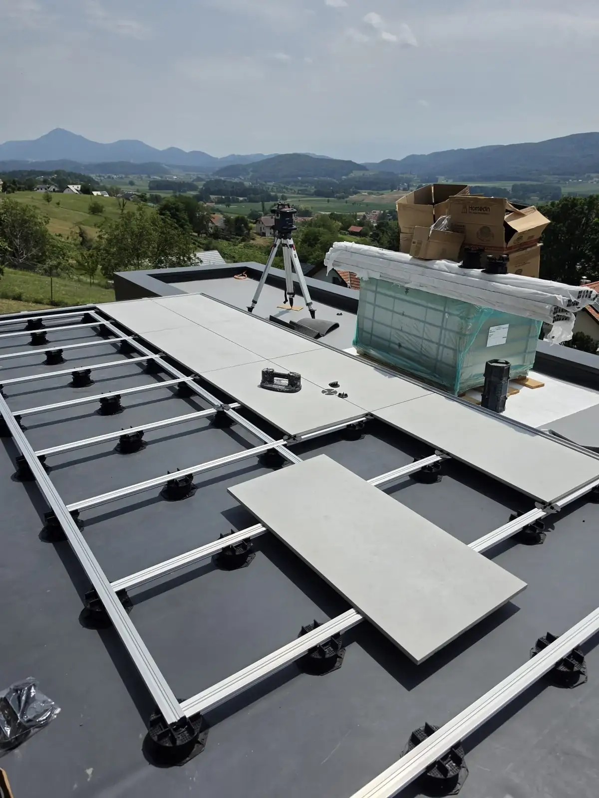Real construction site of a Slovenia mansion rooftop terrace with pedestal grid and aluminium joists