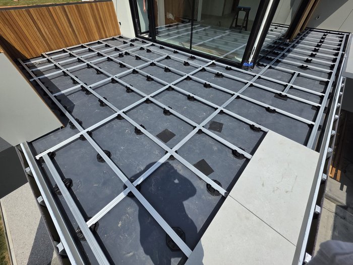 Vitaro adjustable pedestals installed on a rooftop terrace in Slovenia